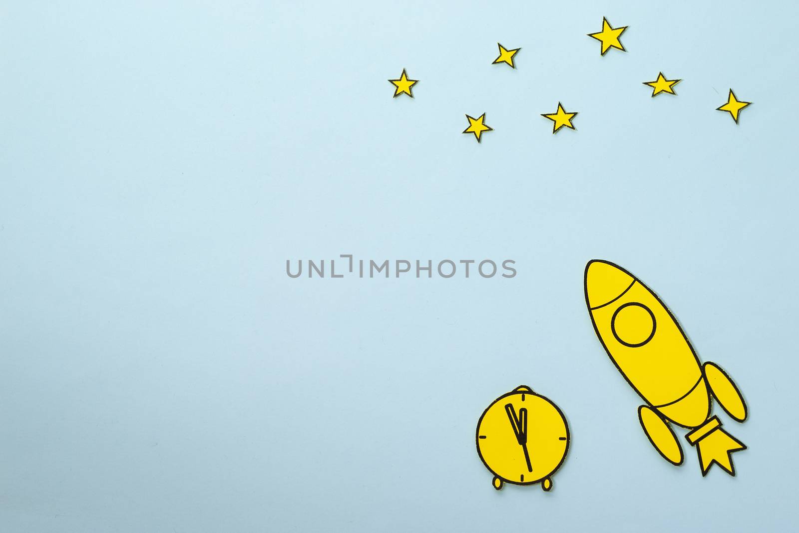 Yellow carton rocket zooming through space with clock and stars on blue background with copy space