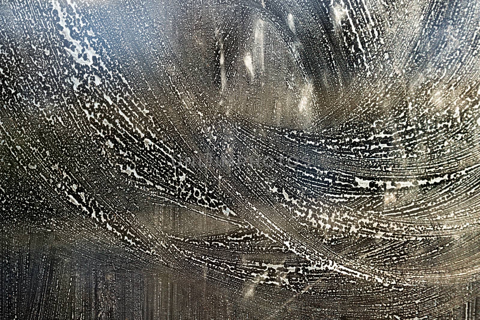 Backlit dirty glass texture, abstract grungy background