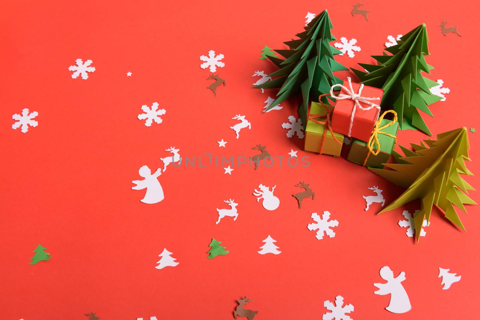 Christmas or New Year background, plain composition made of Xmas decorations and fir branches, flat lay, blank space for a greeting text.