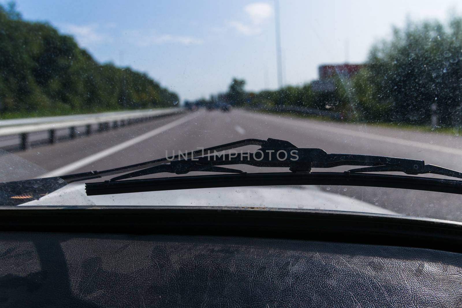 View of a passenger from the passenger compartment on the highwa by alexsdriver