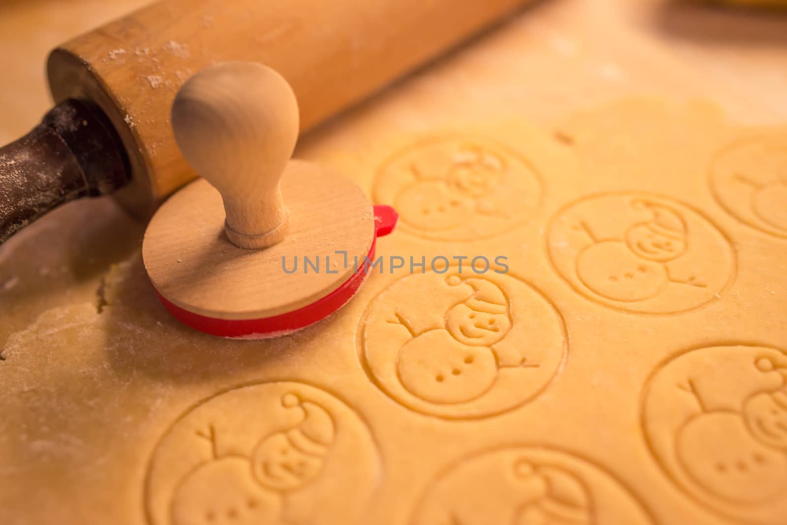 Christmas cookies bakery with raw biscuit dough and cutters with christmas theme shape - Christmas theme dough stamp, Snowman. by petrsvoboda91