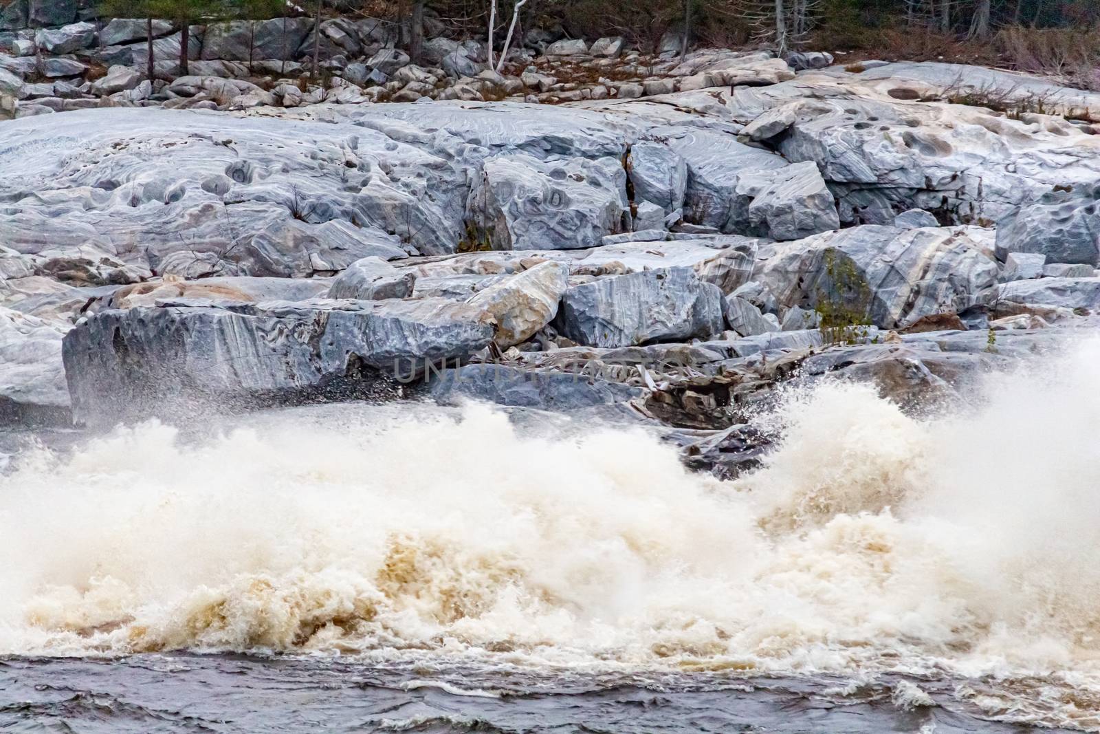 Rushing Whitewater Crashing into a River by Rocks by colintemple