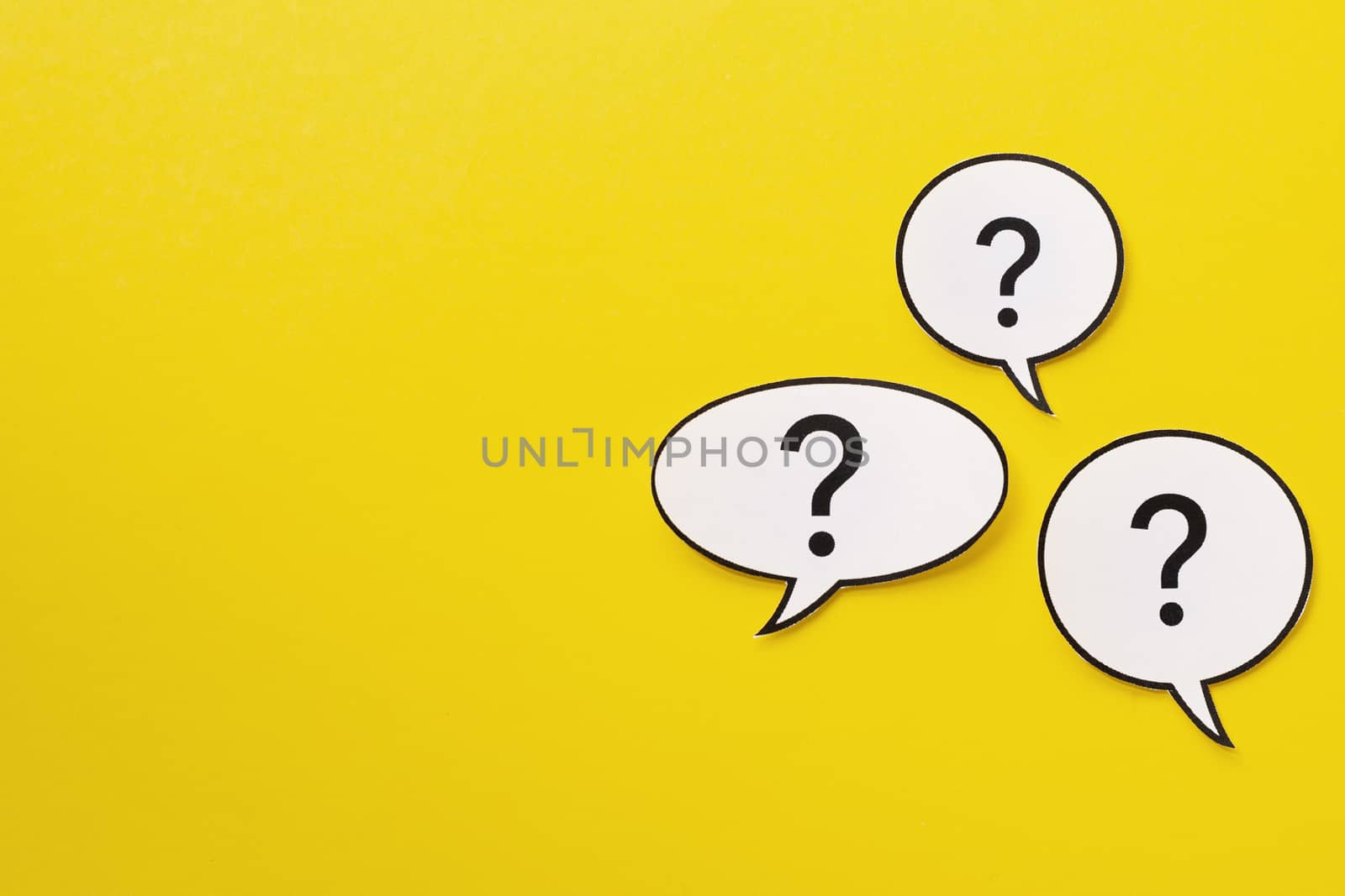 Three different shaped speech bubbles over a bright yellow background by sergii_gnatiuk