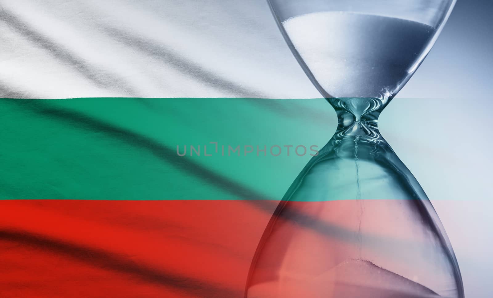 Flag of Bulgaria with superimposed hourglass conceptual of deadlines by sergii_gnatiuk