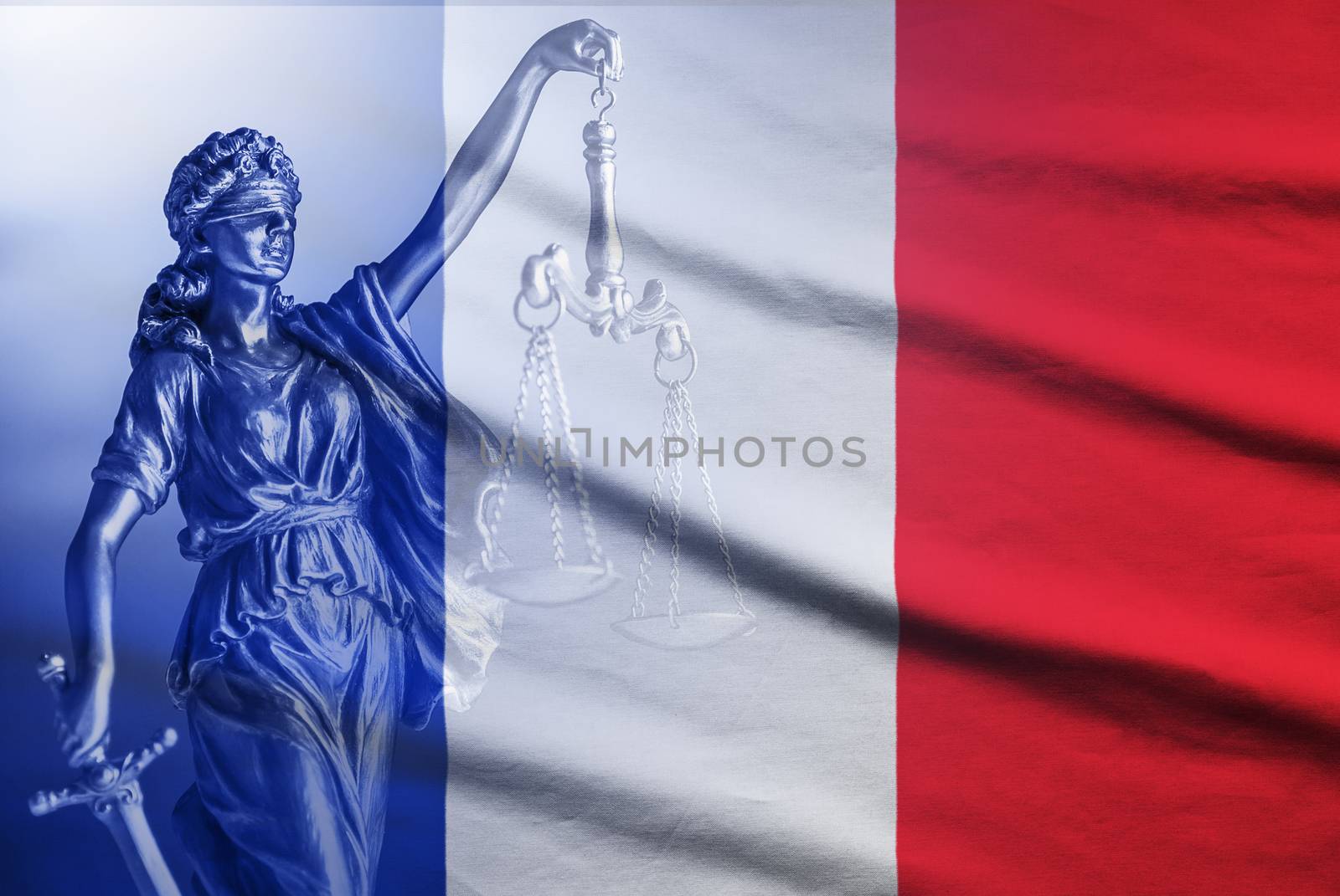 National flag of France with a statue of Justice holding the scales and sword of impartiality and law enforcement