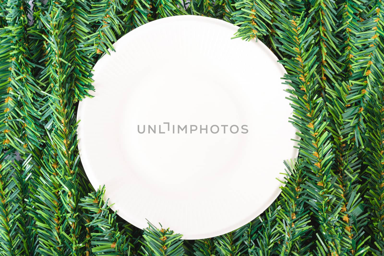 Happy New Year and Christmas day, top view flat lay composition decoration branches tree, white round on white background with copy space for your text