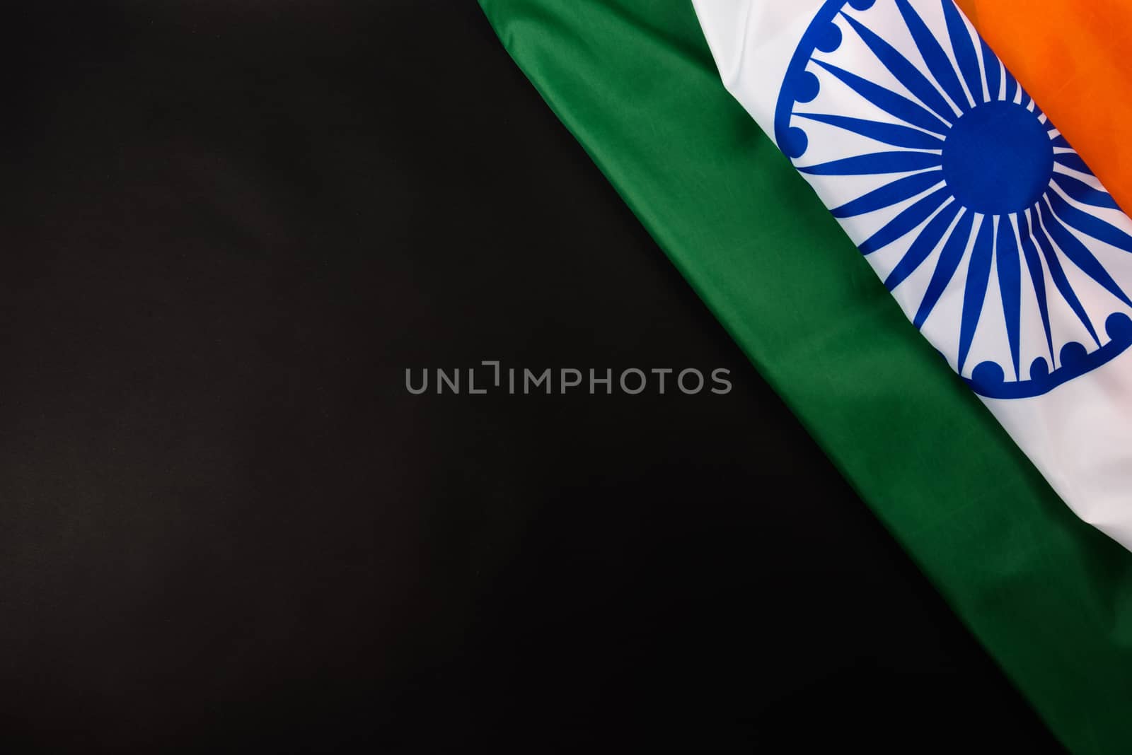 Indian republic day, flat lay top view, Indian flag on black background with copy space for your text