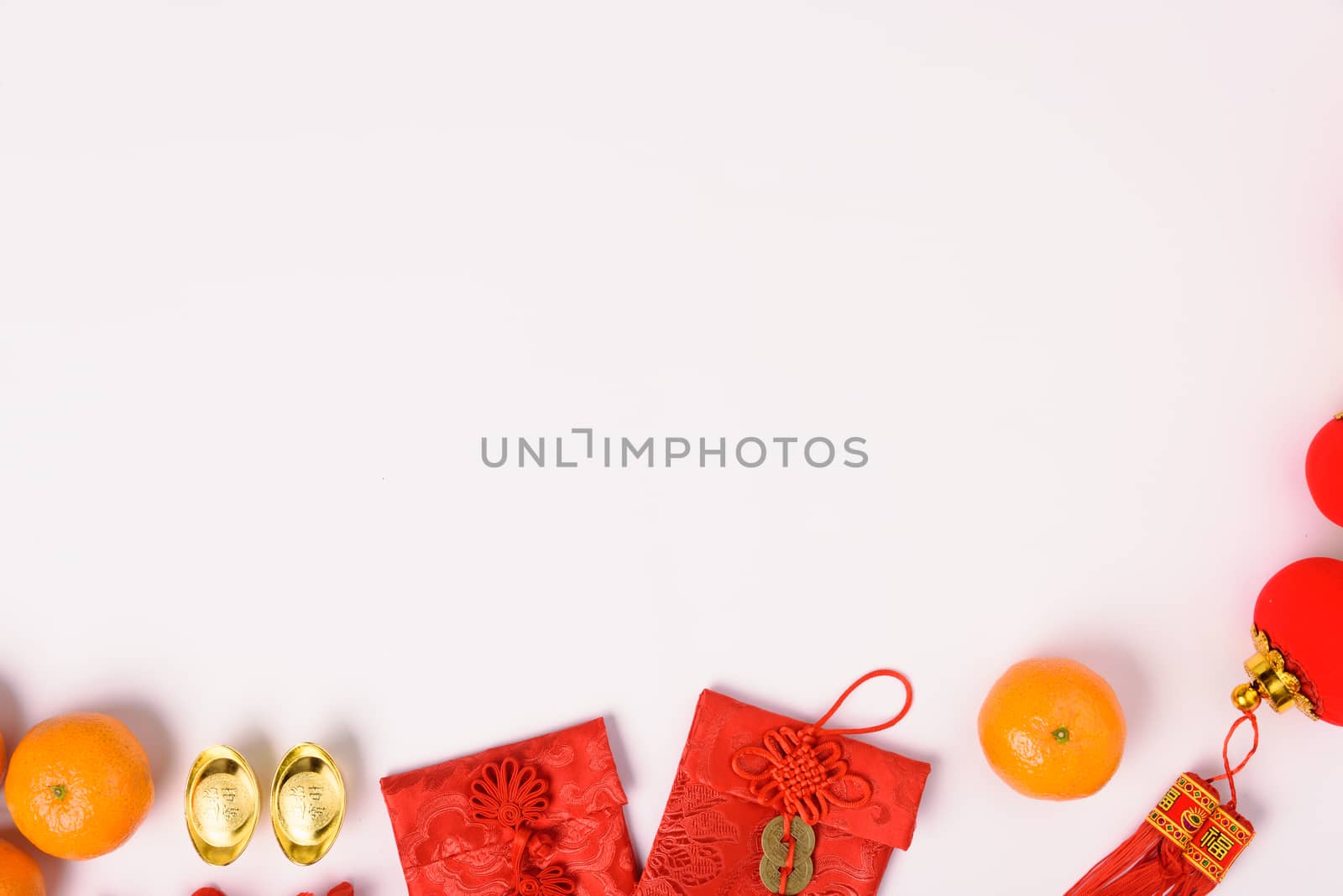 Chinese new year festival concept, flat lay top view, Happy Chinese new year with Red envelope and gold ingot (Character "FU" means fortune, blessing) on white background with copy space for text