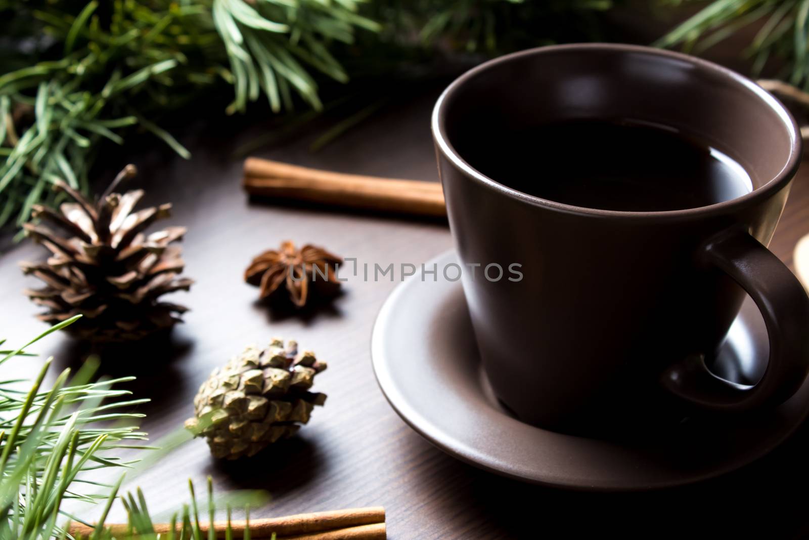 Christmas new year concept with coffee Cup, Christmas tree and cones. Layout with a Cup of coffee for new year and Christmas.