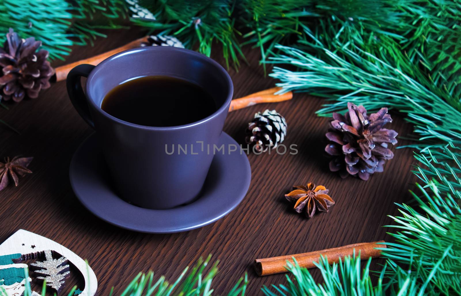 Christmas new year concept with coffee Cup, Christmas tree and cones. Layout with a Cup of coffee for new year and Christmas.