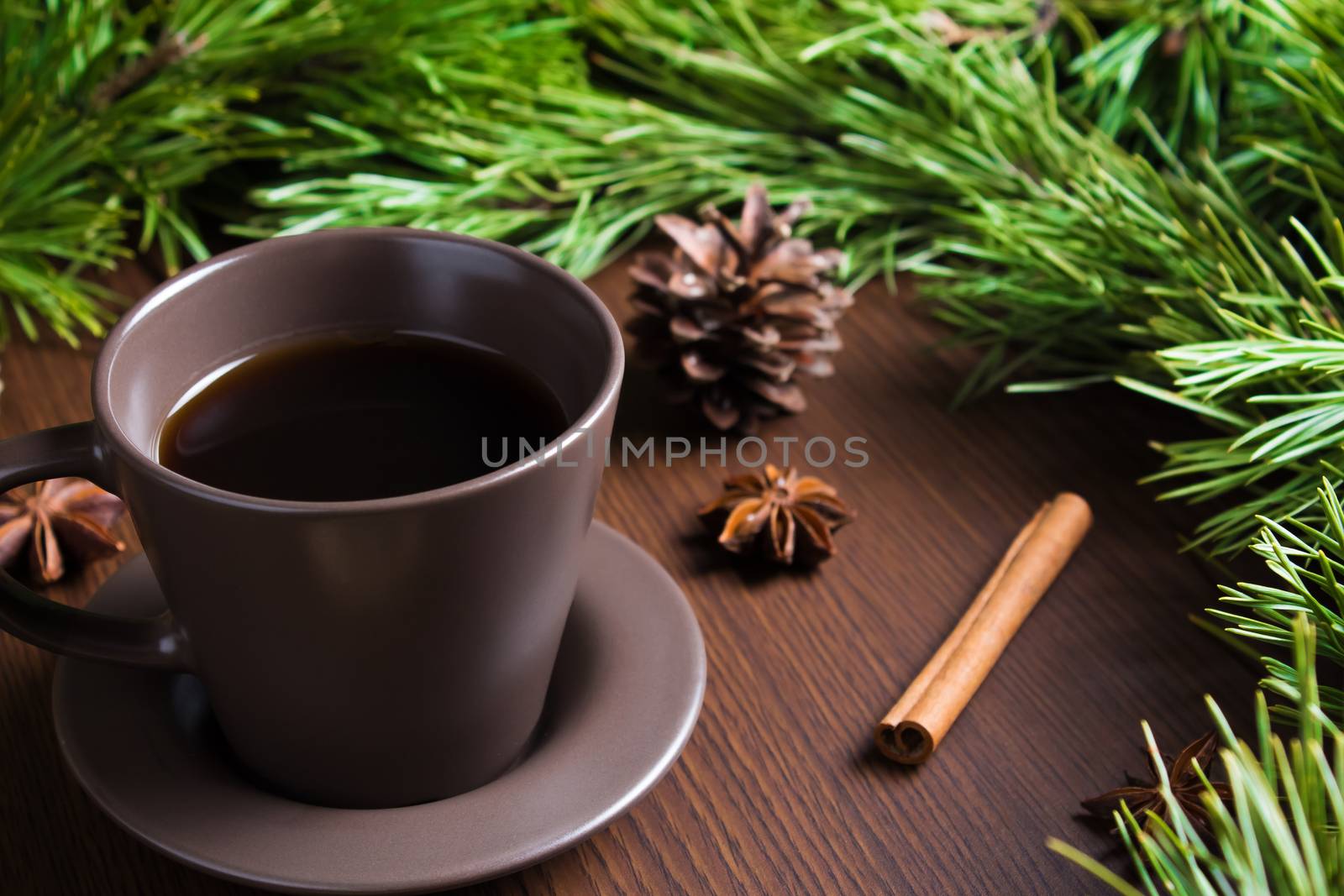 Christmas new year concept with coffee Cup, Christmas tree and cones. Layout with a Cup of coffee for new year and Christmas.