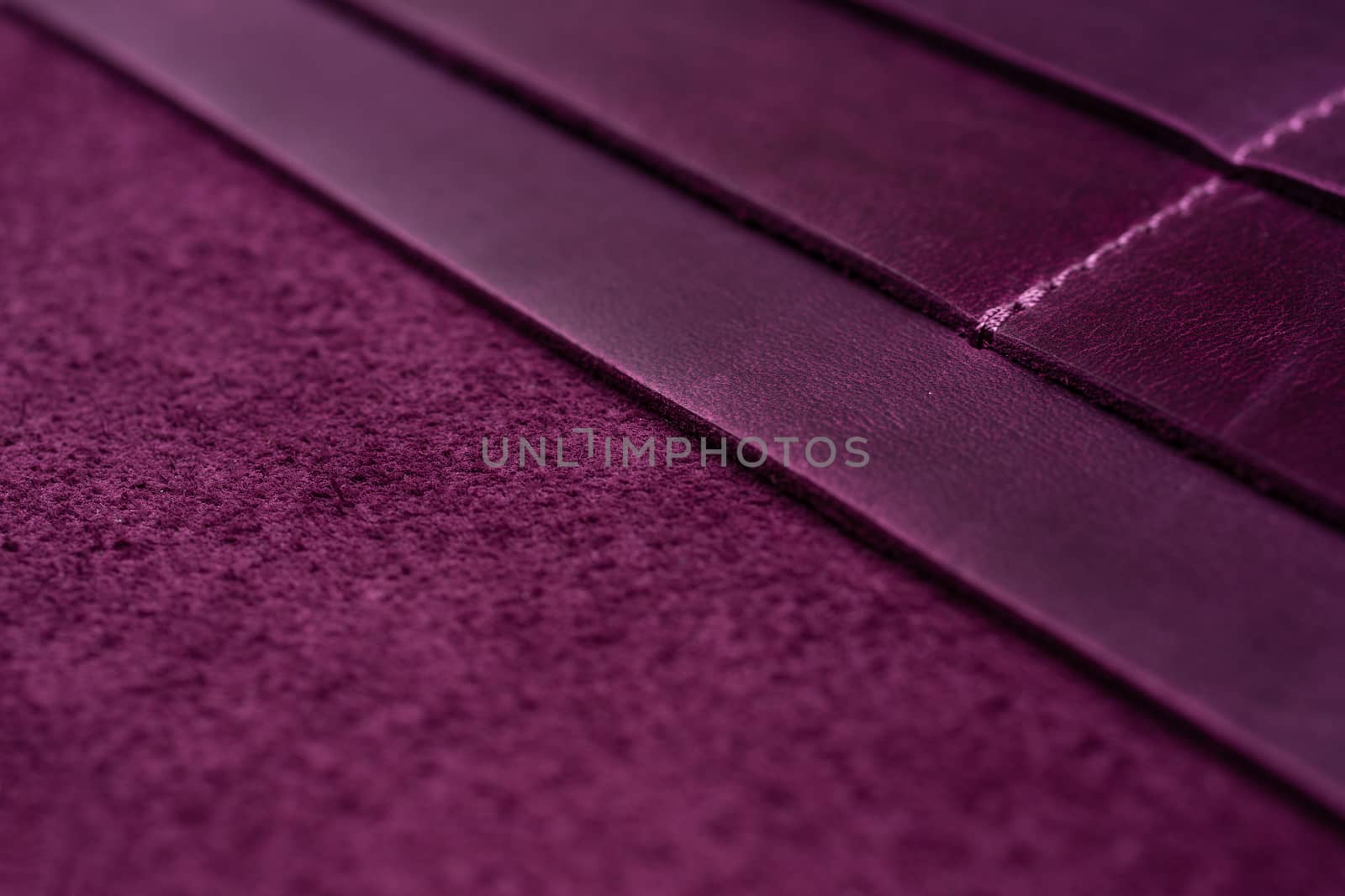 Purple handmade leather wallet details closeup by alexsdriver