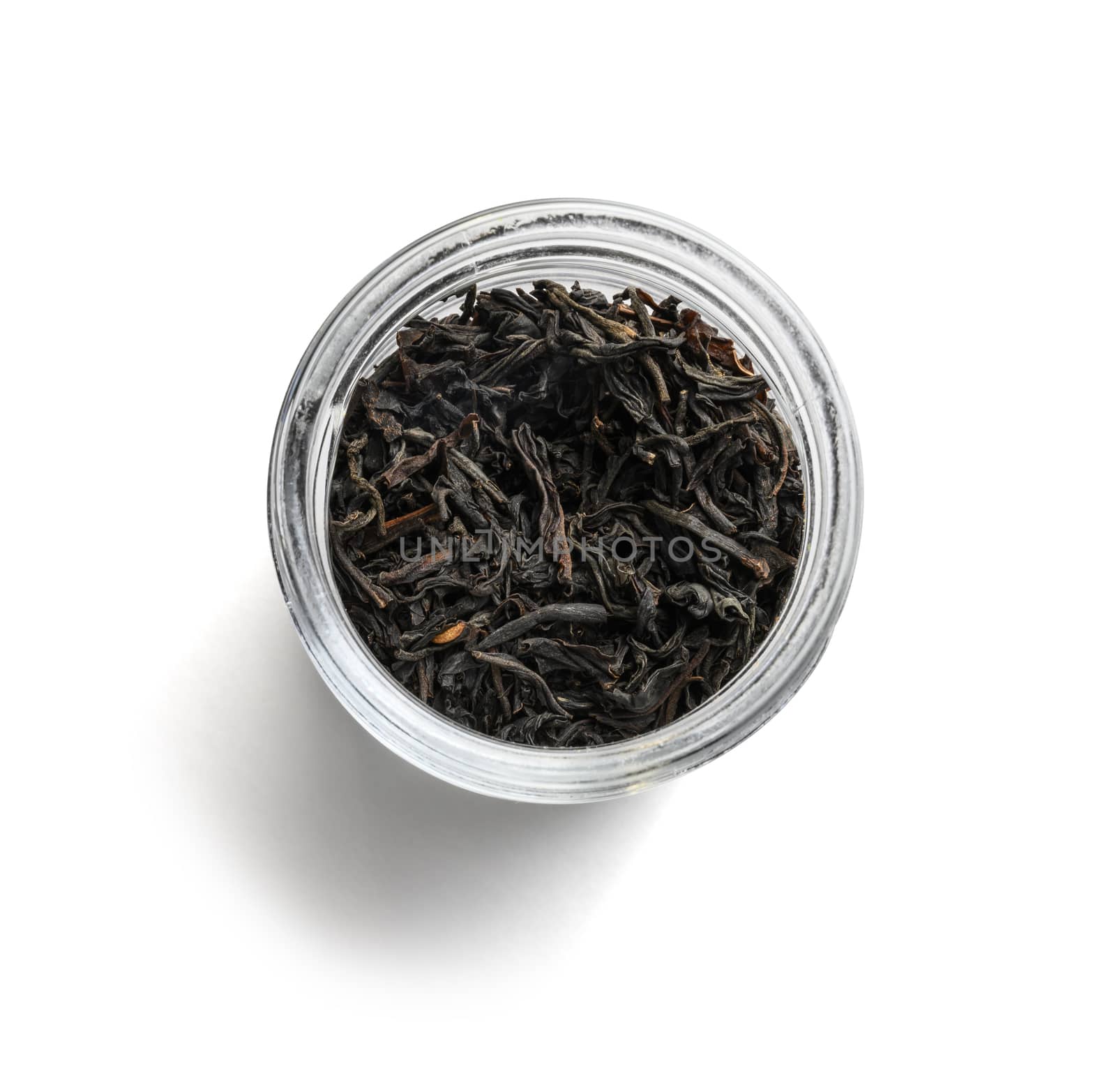Black tea top view on white background.
