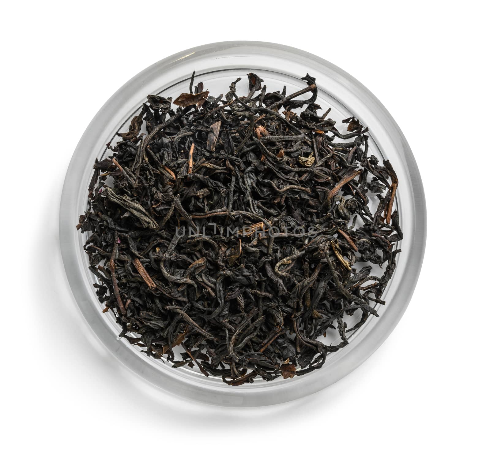 Black tea top view on white background.