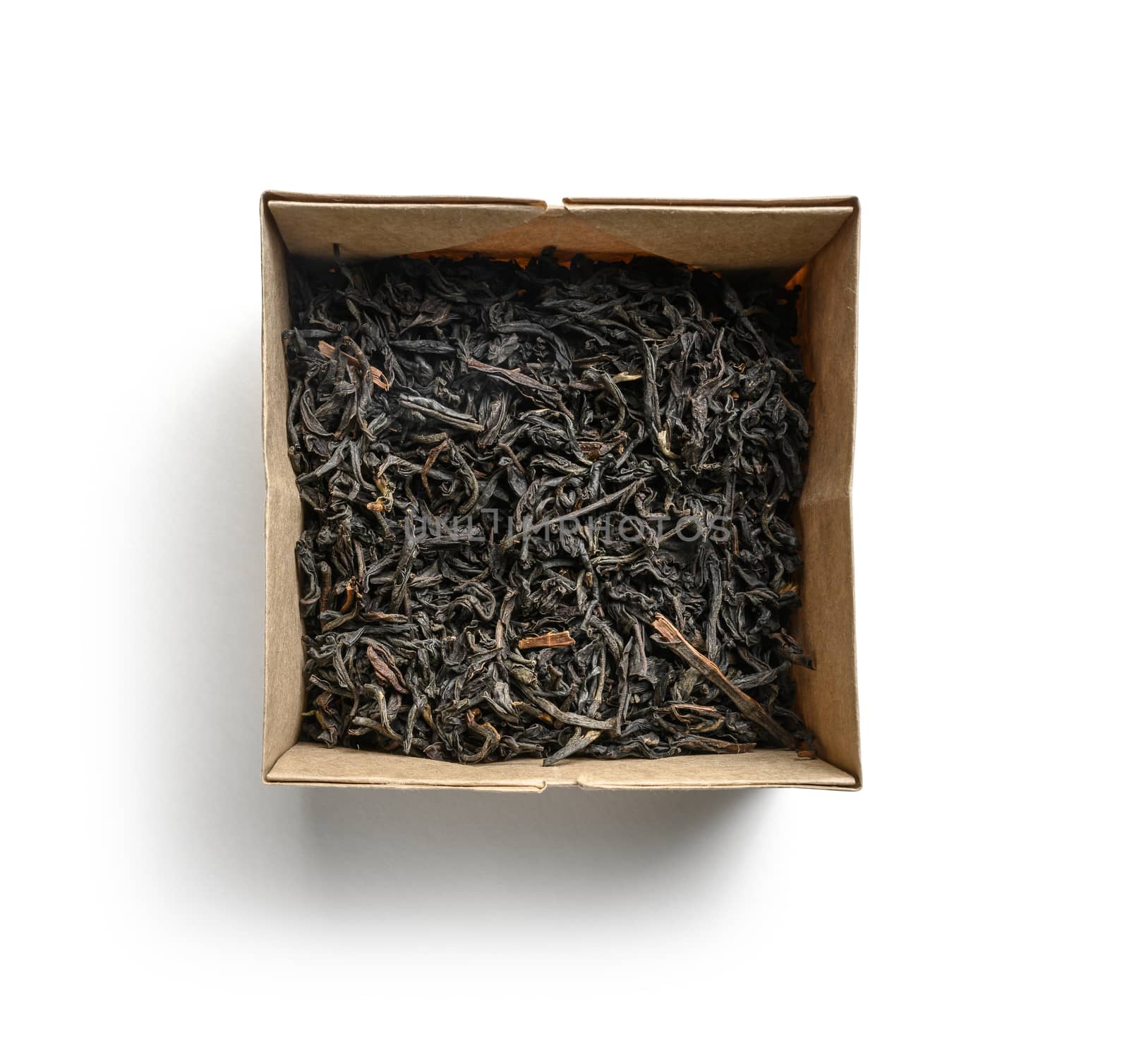 Black tea top view on white background.