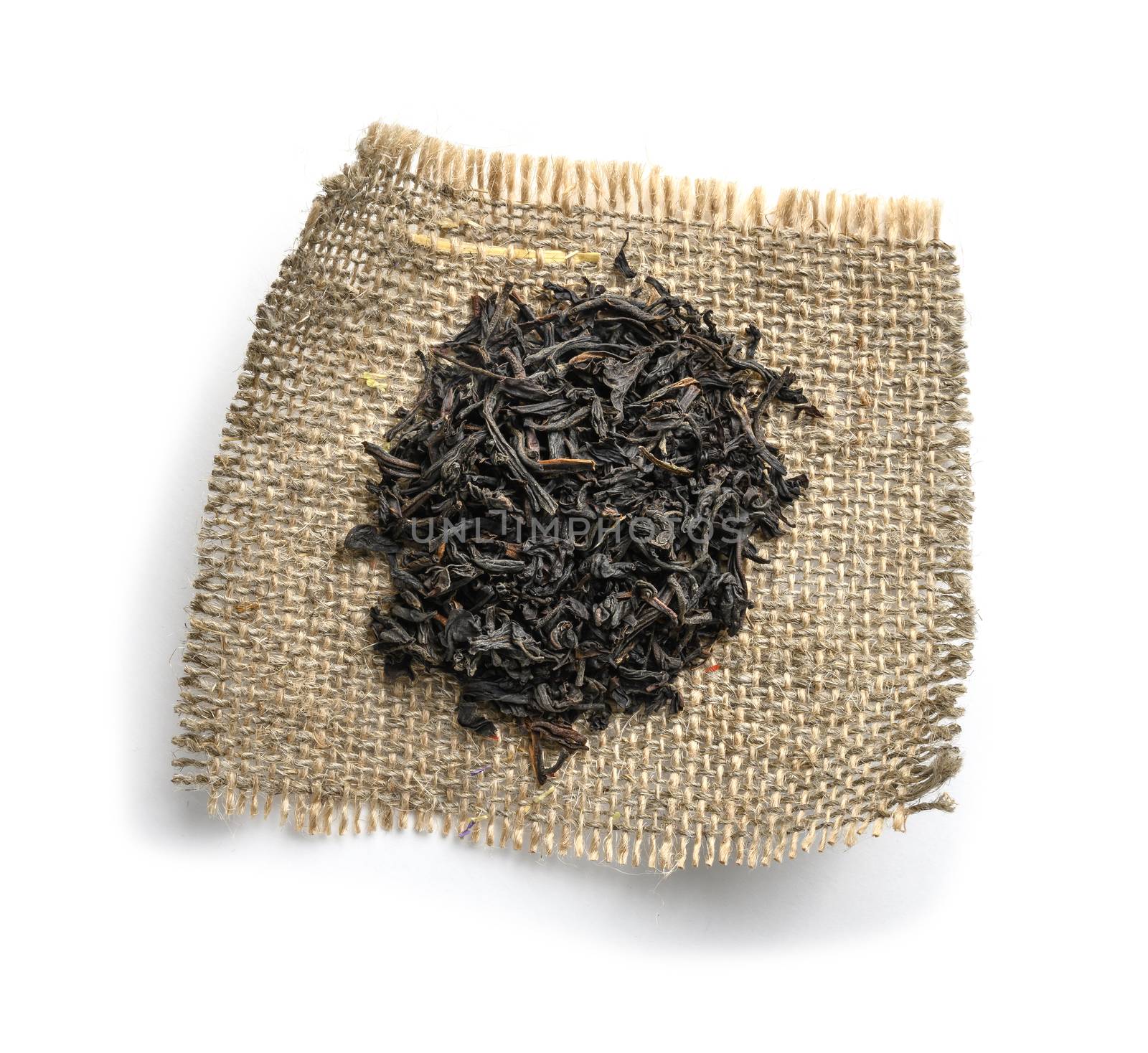 Black tea top view on white background.