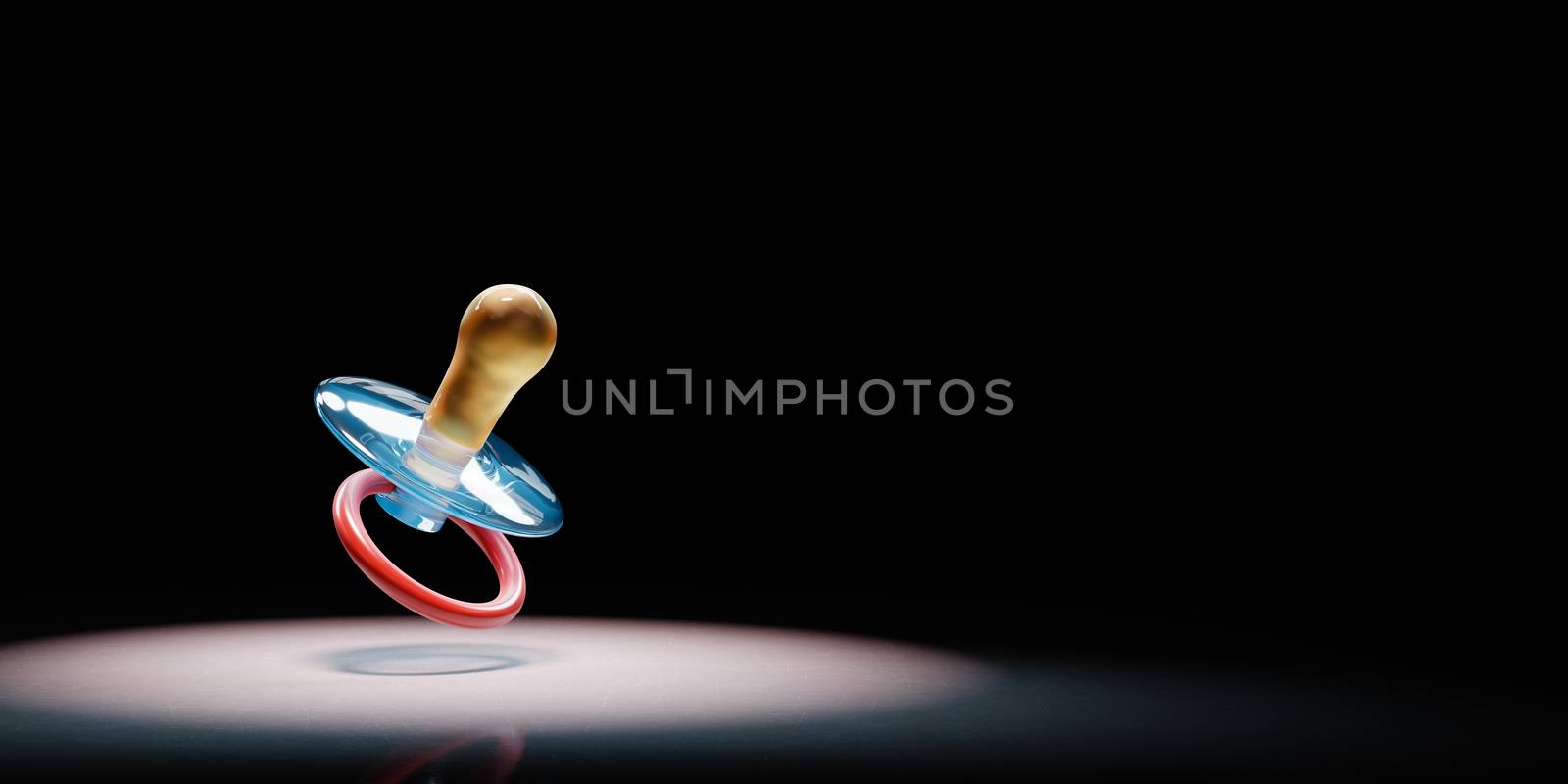 Baby's Pacifier Spotlighted on Black Background by make