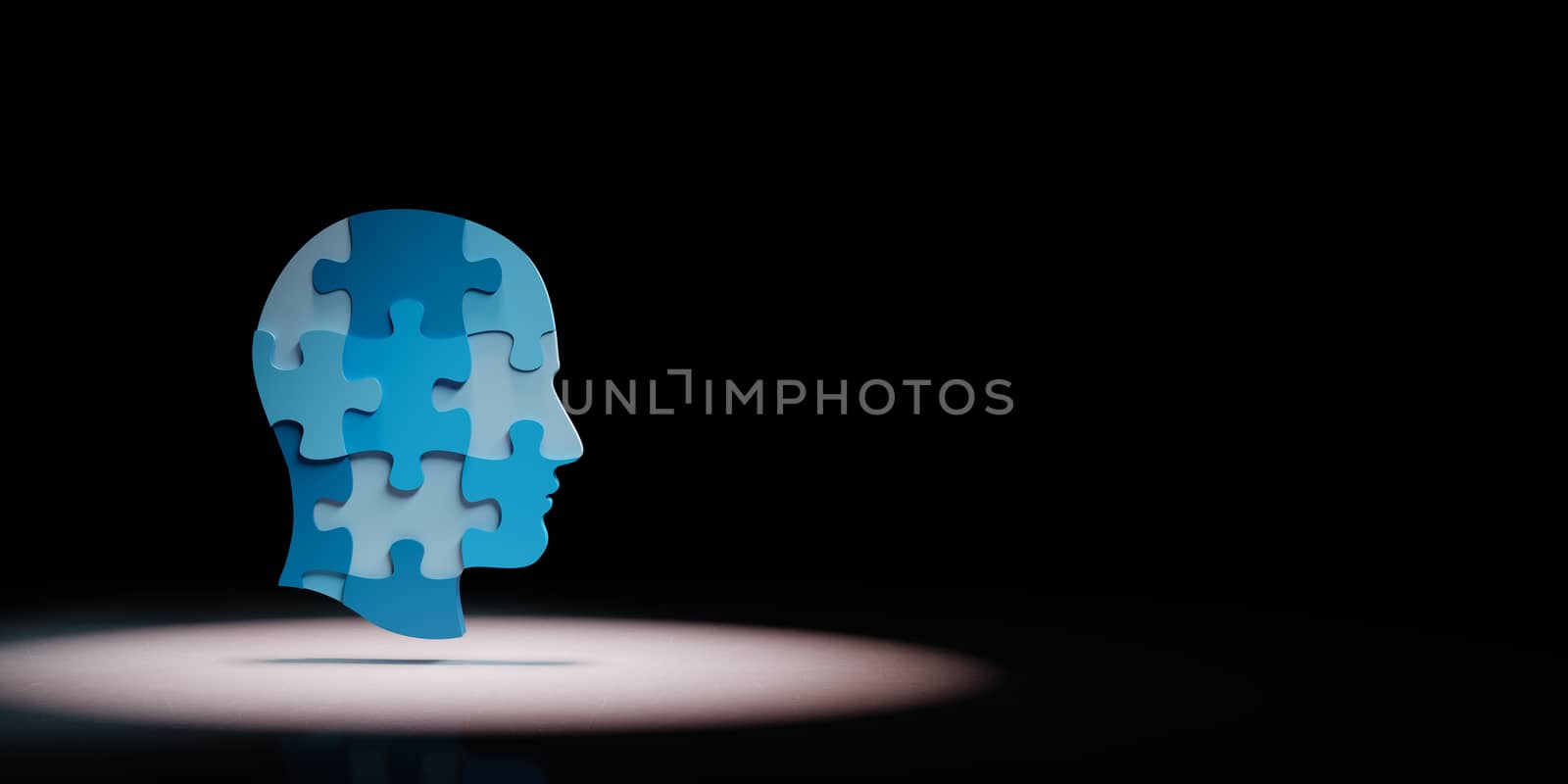 Blue Human Puzzle Head Shape Spotlighted on Black Background with Copy Space 3D Illustration