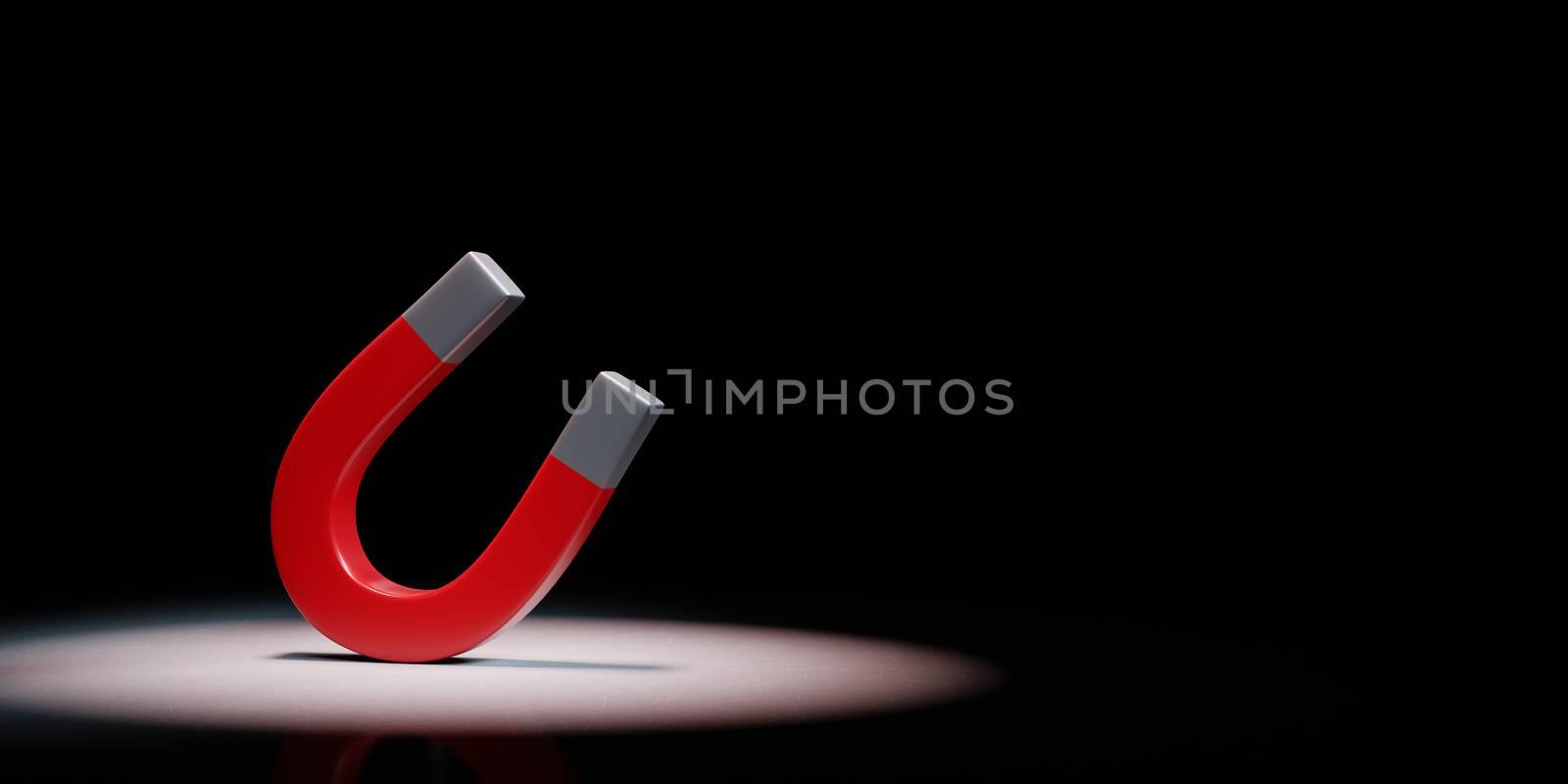 Red Magnet Spotlighted on Black Background by make