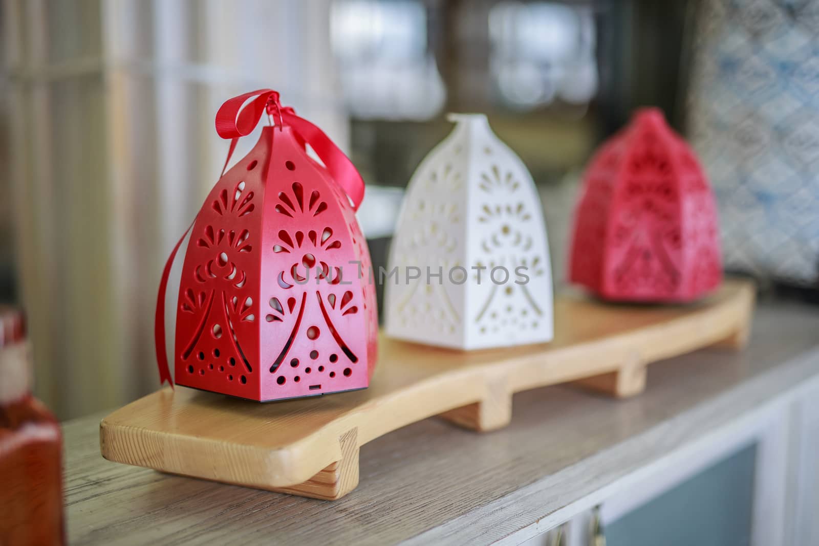 Oriental lamps candle holders on a wooden stand