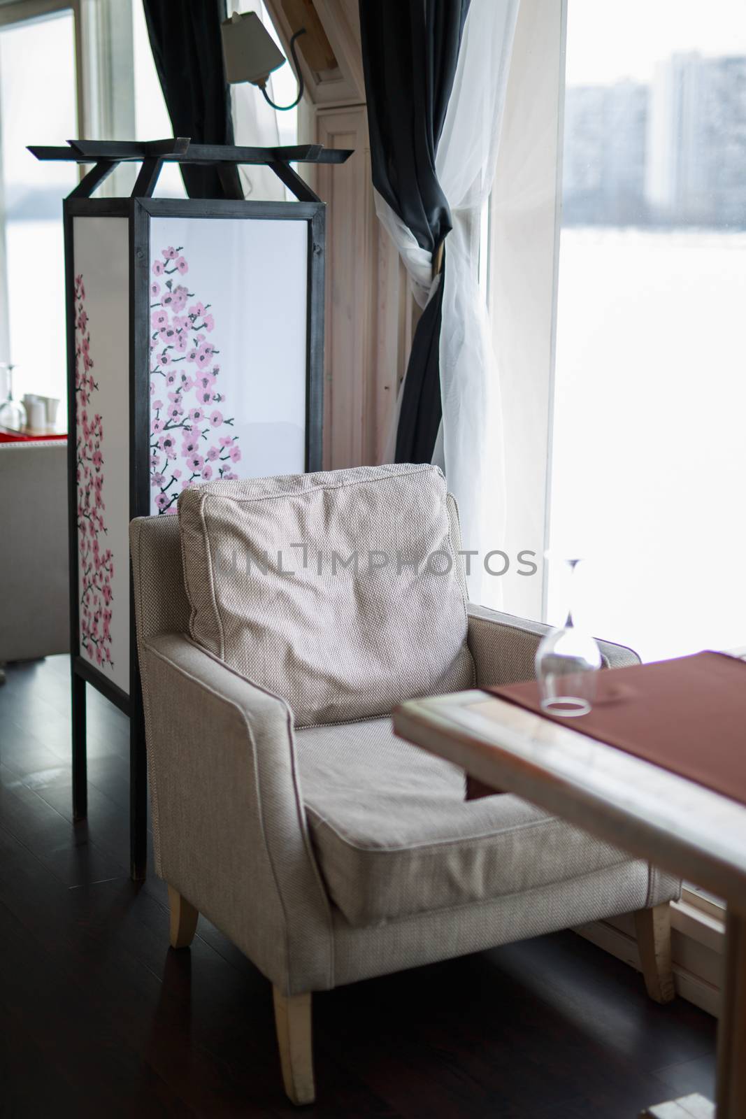 table near the window of a large light window, restaurant cozy interior texture of a wooden wall by dikkens