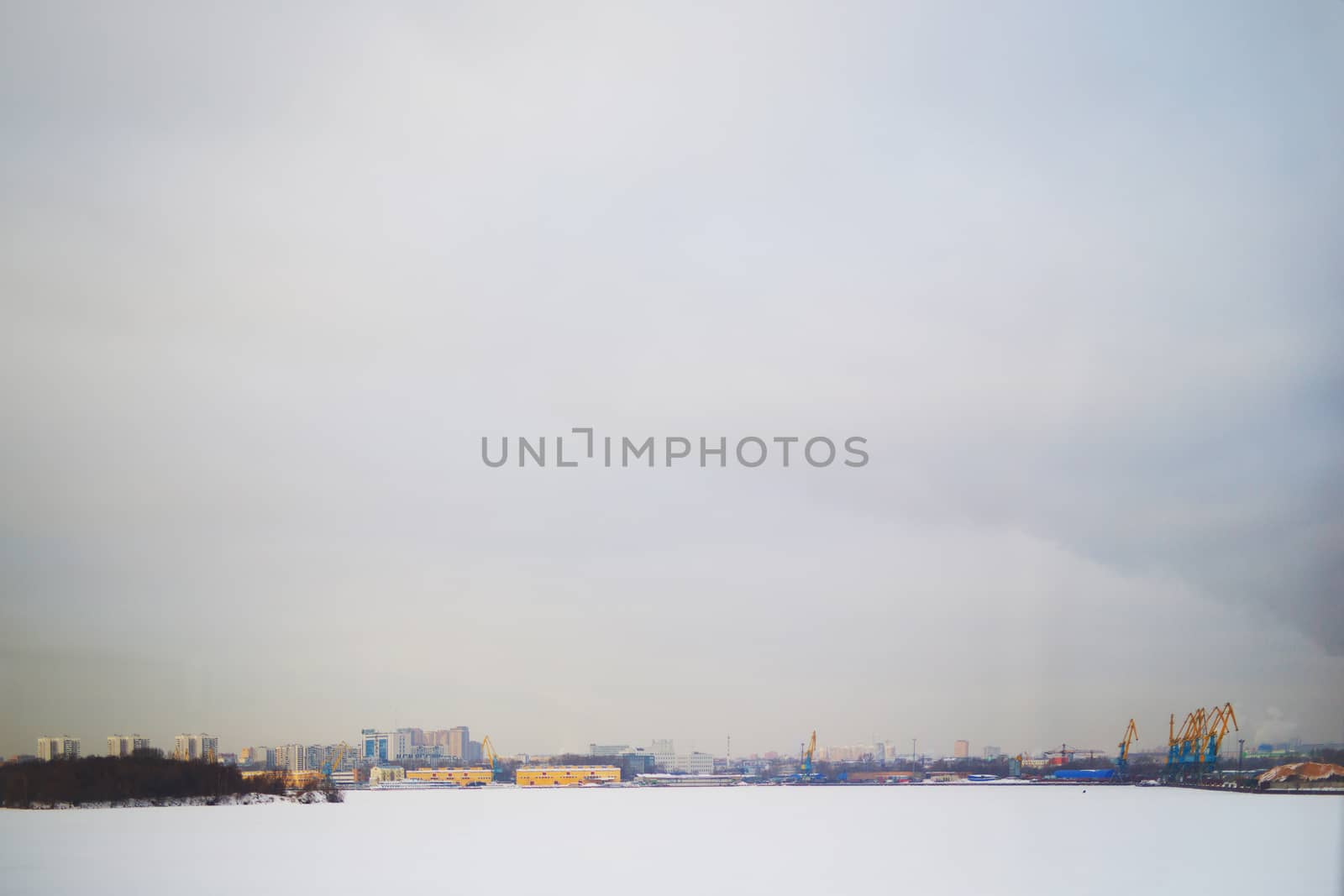 background winter view of the city from the river, background for text