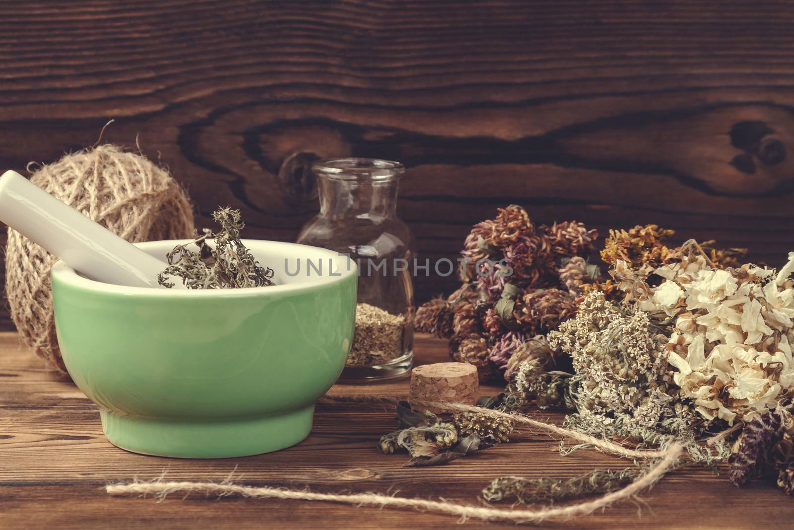 Drying and harvesting of medicinal herbs, homeopathy and alternative medicine concept by galsand