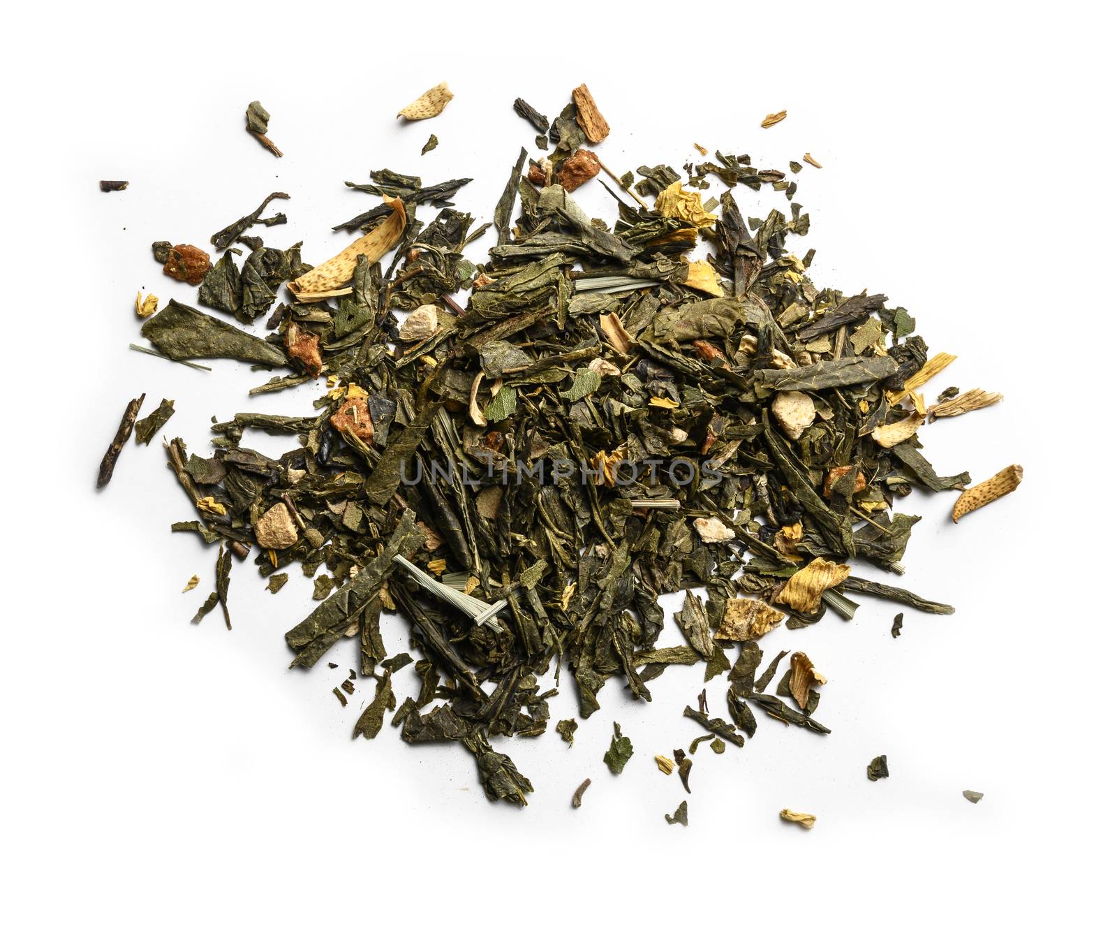 Green tea with aromatic additives. Top view on white background.