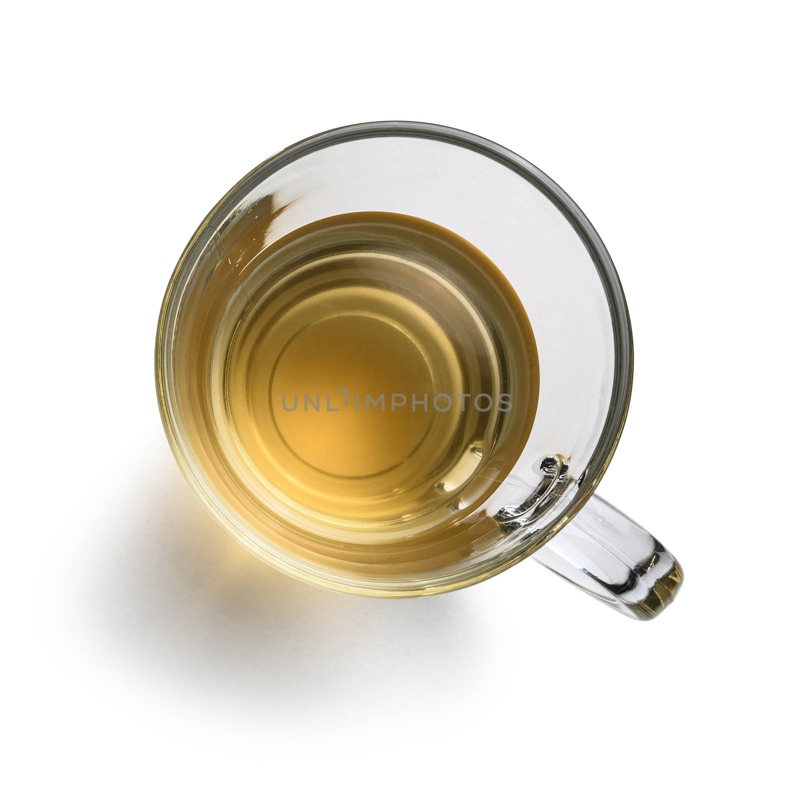 Tea in a glass mug on a white background. The view from the top.