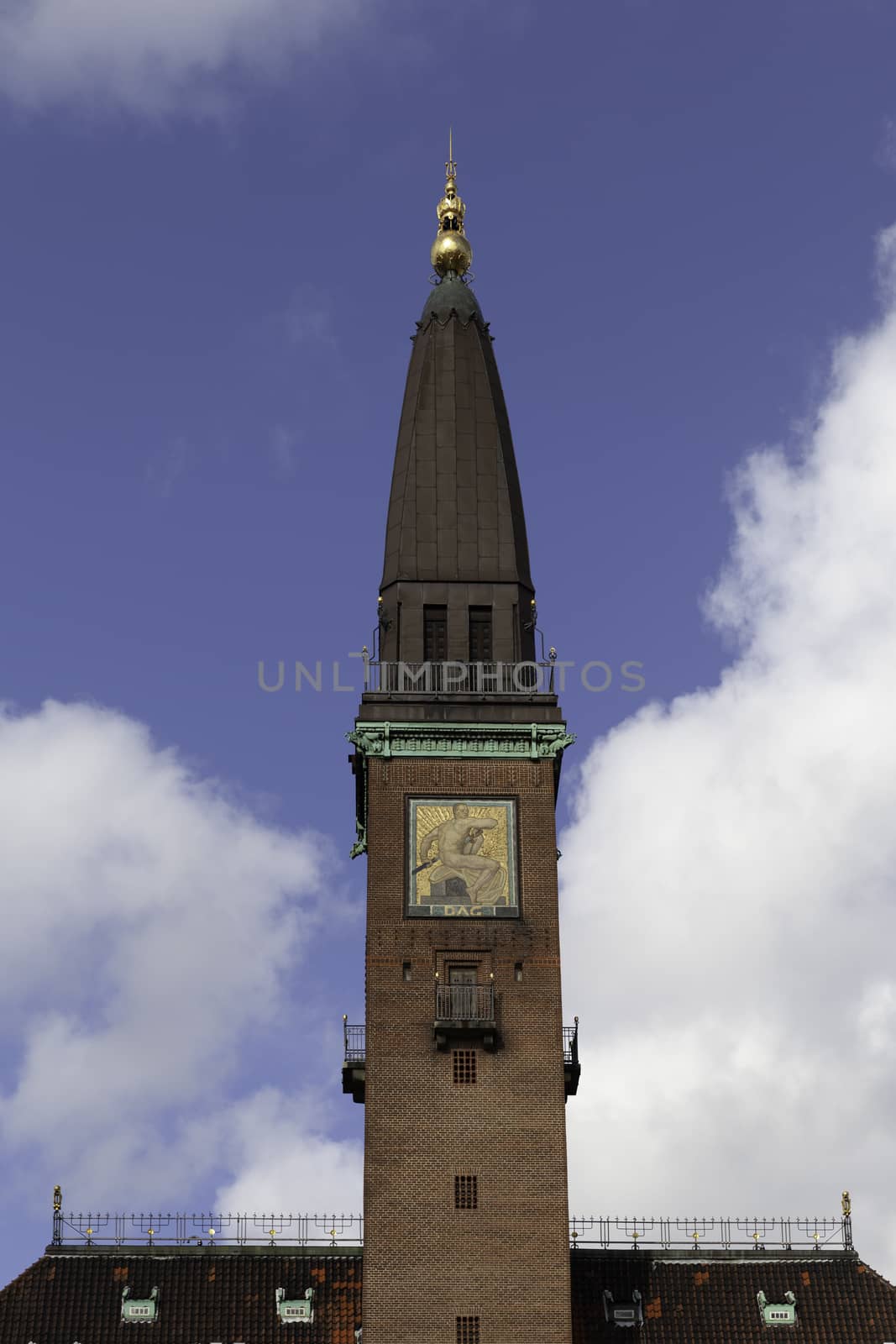 COPENHAGEN, DENMARK - 12 September 2019: Close-up view of Scandic Palace Hotel tower with the blue sky on the background