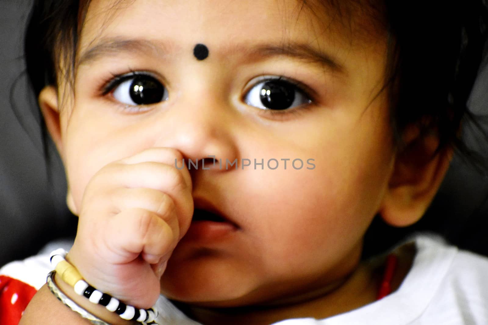 A cute Baby Girl in Joy Mood