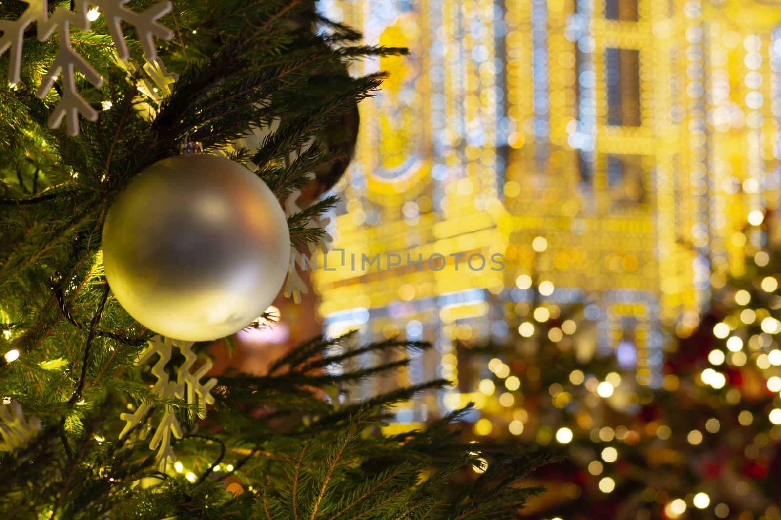 Colorful bokeh defocused Christmas fairy lights, New Year's fair by bonilook