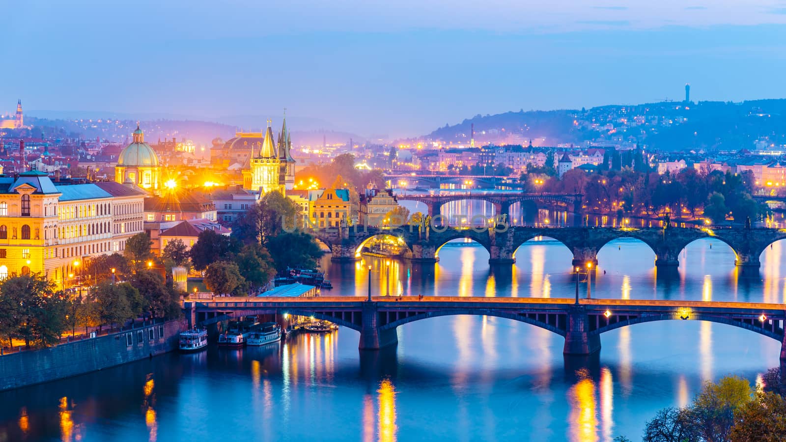 Prague bridges over Vltava River in the evening, Praha, Czech Republic by pyty