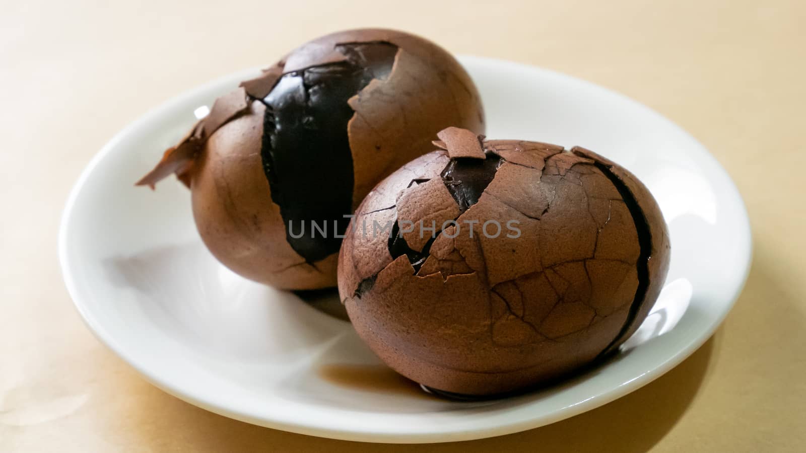 The close up of Taiwan Tea Eggs on mini white plate.