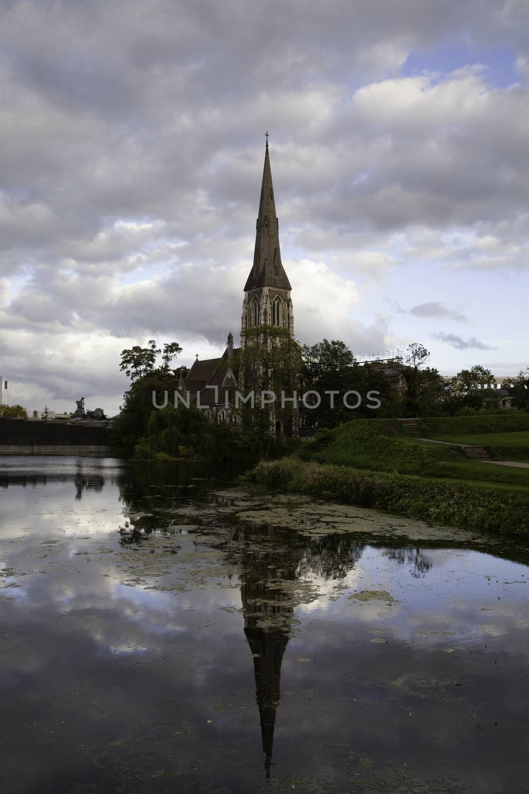 Copenhagen Denmark - September 13 2019: St. Alban's Church reflected in the water at susnet