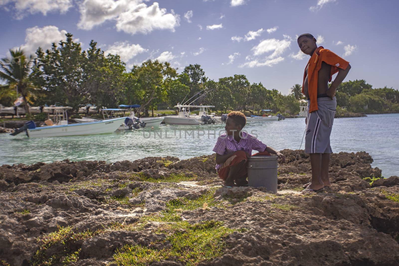 Poor Dominican children play in Bayahibe 10 by pippocarlot