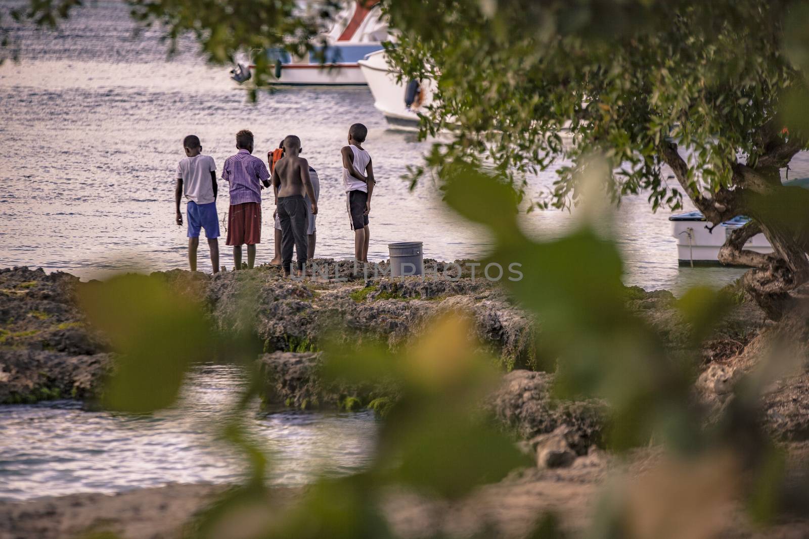 Poor Dominican children play in Bayahibe 5 by pippocarlot