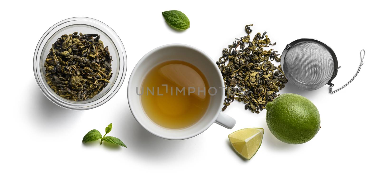 Green tea and accessories top view on white background by butenkow