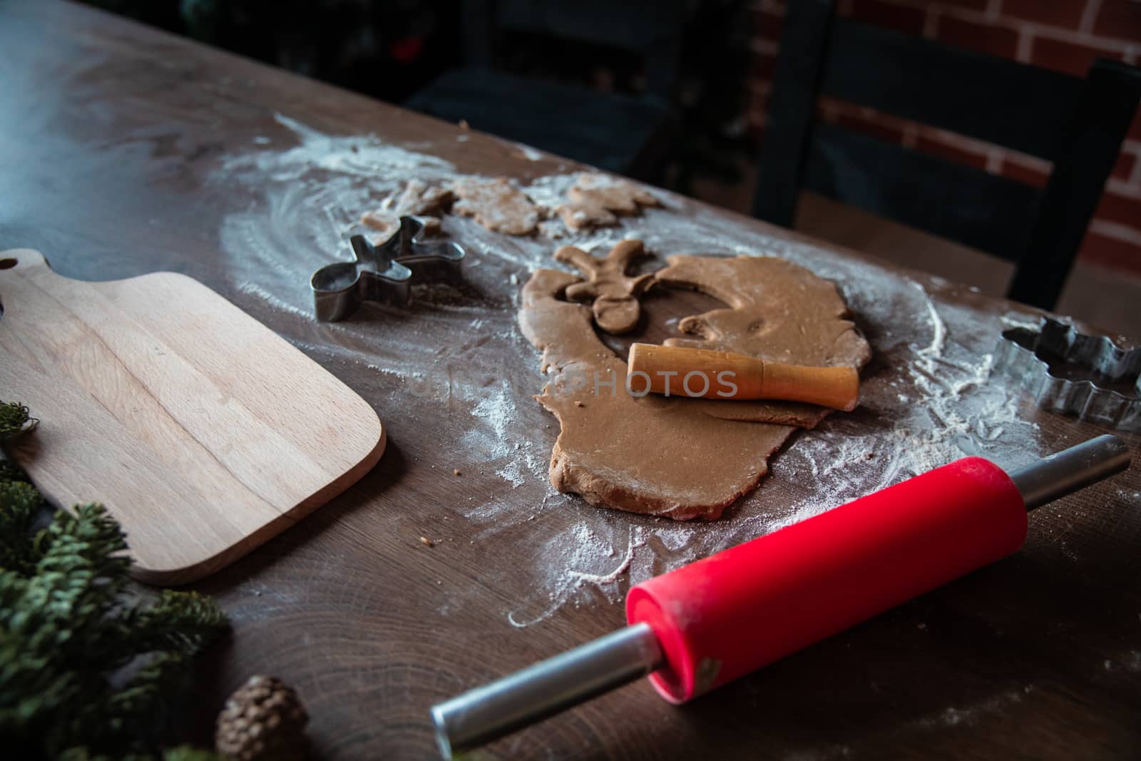 Dough and christmas cookie. Children making christmas cookies in the kitchen