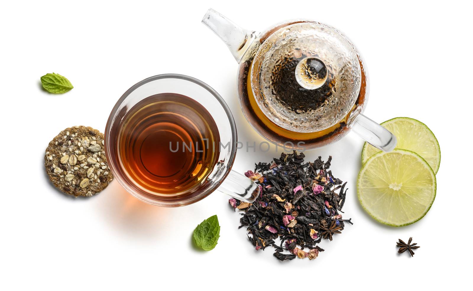 Black tea with natural aromatic additives and accessories. Top view on white background.