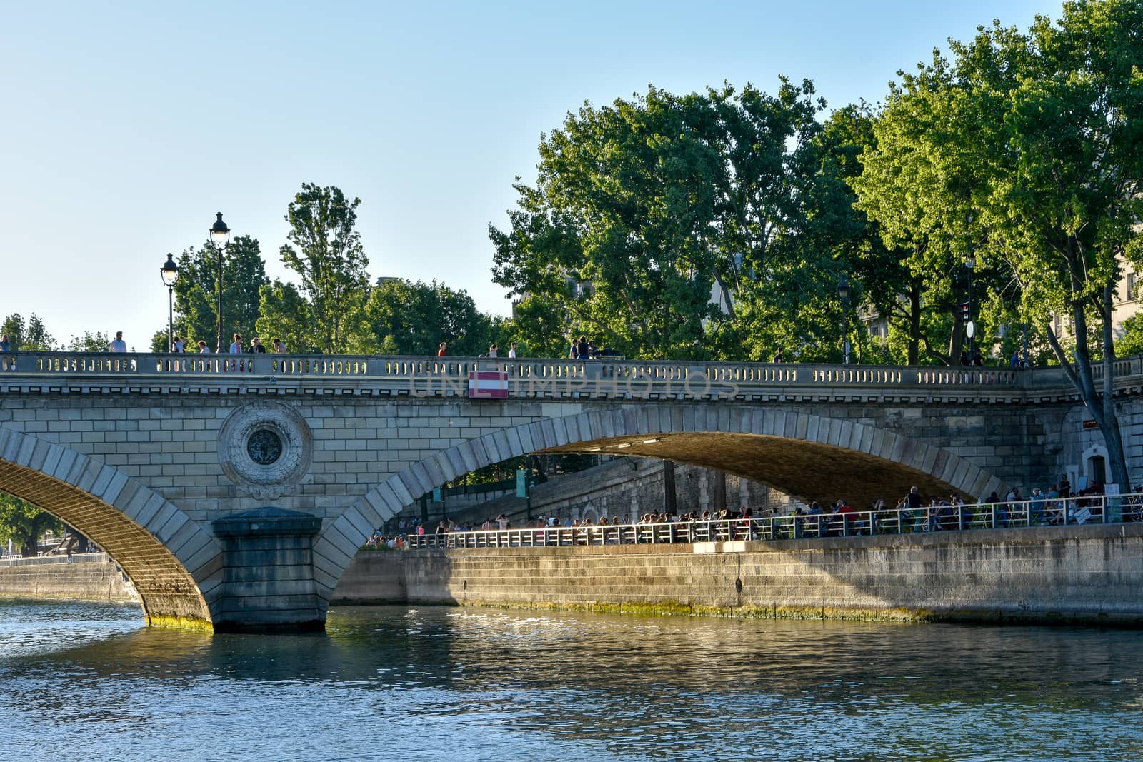 visit of Paris, Seine quay and Eiffel tower, walk in the parks of the capital of France in summer