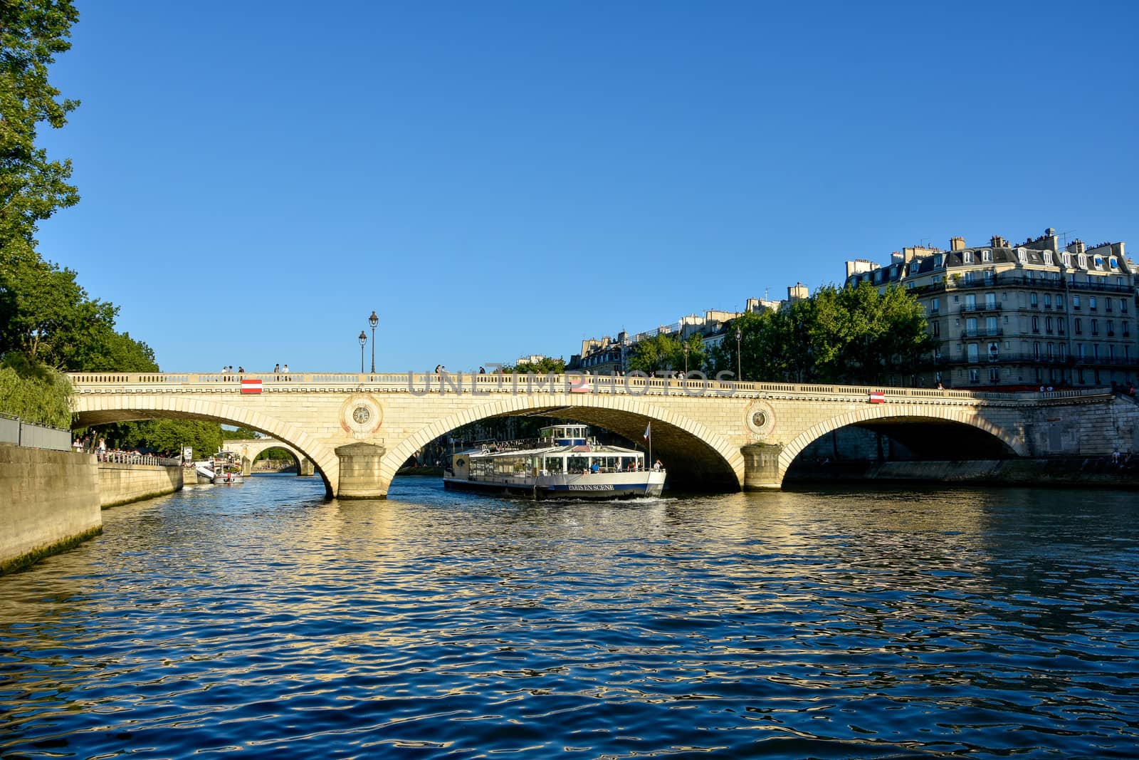 visit of Paris, Seine quay and Eiffel tower, walk in the parks of the capital of France in summer