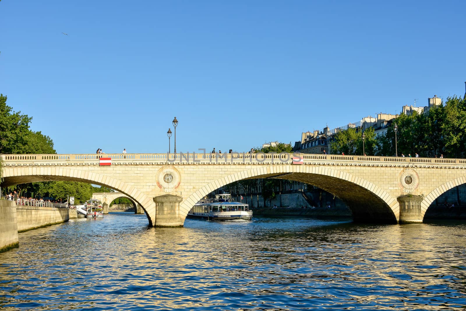 visit of Paris, Seine quay and Eiffel tower, walk in the parks of the capital of France in summer