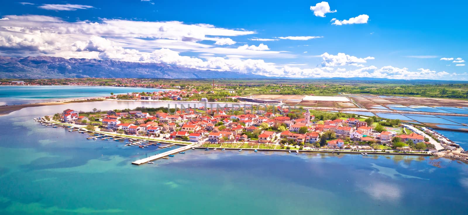 Nin. Historic town of Nin laguna aerial panoramic view with Velebit mountain background, Dalmatia region of Croatia
