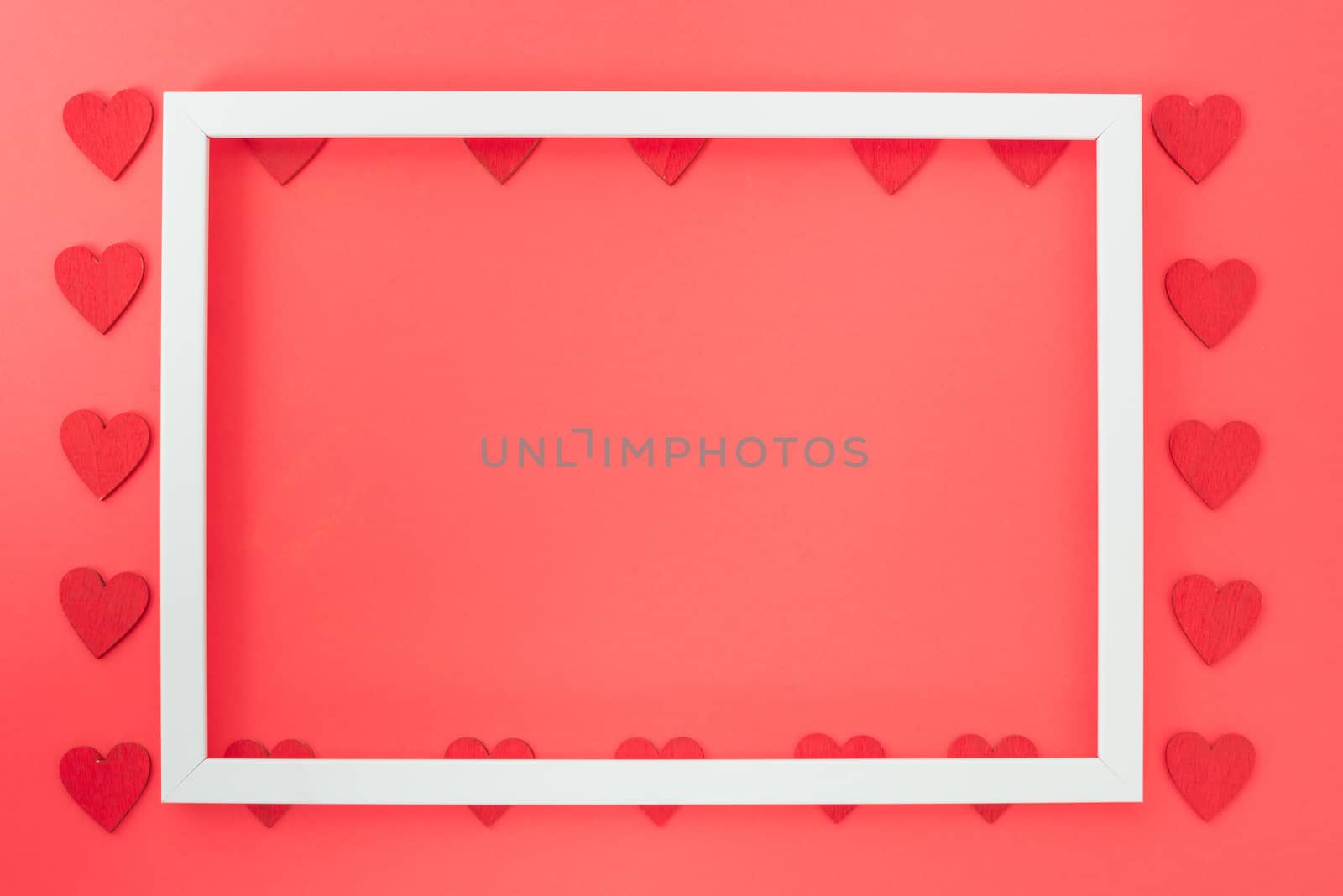 Valentine's Day background, Top view Flat lay Red heart round photo frame on red background. Valentines day concept with copy space