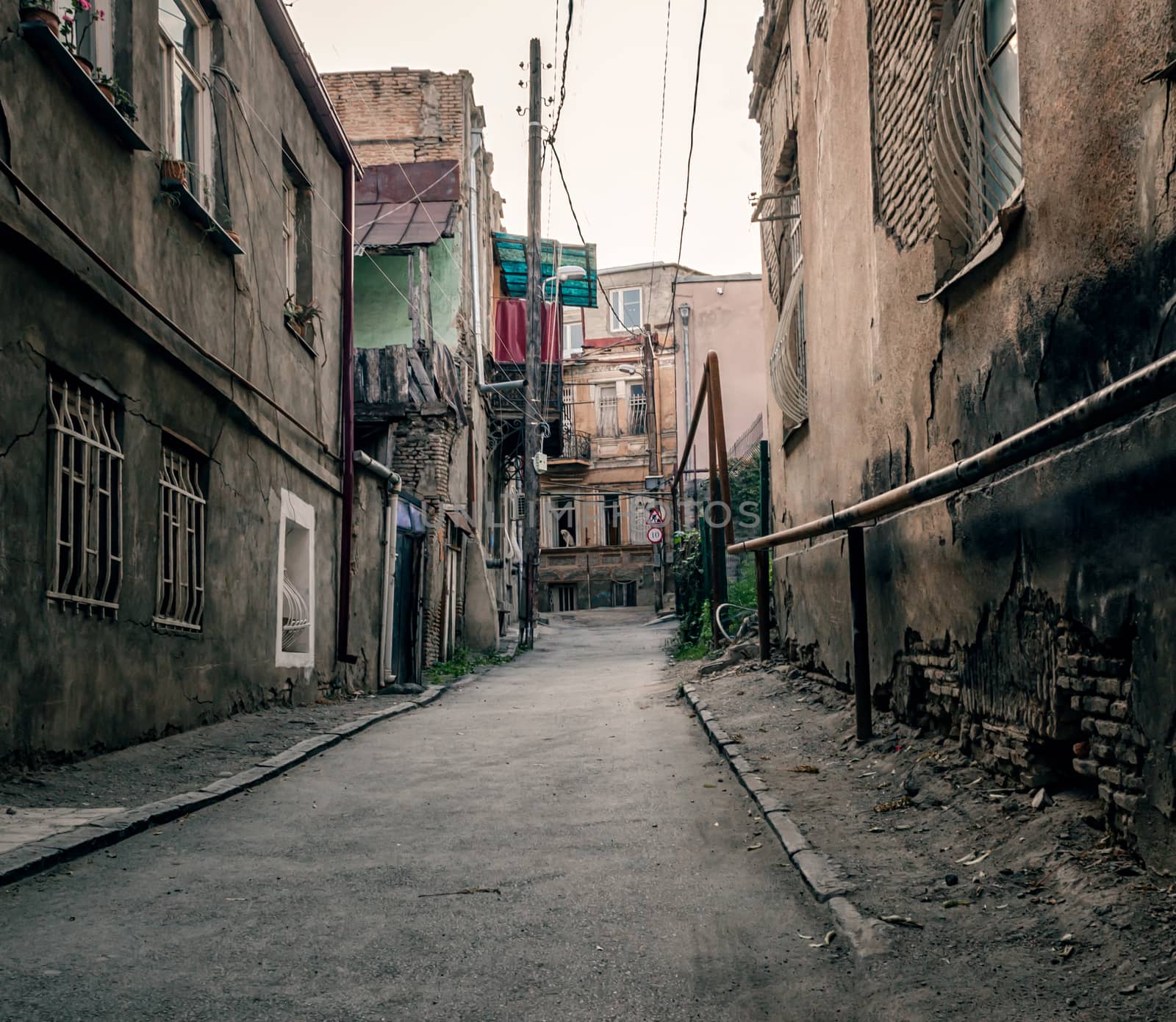 slum old town street with ruined shacks in Georgia country