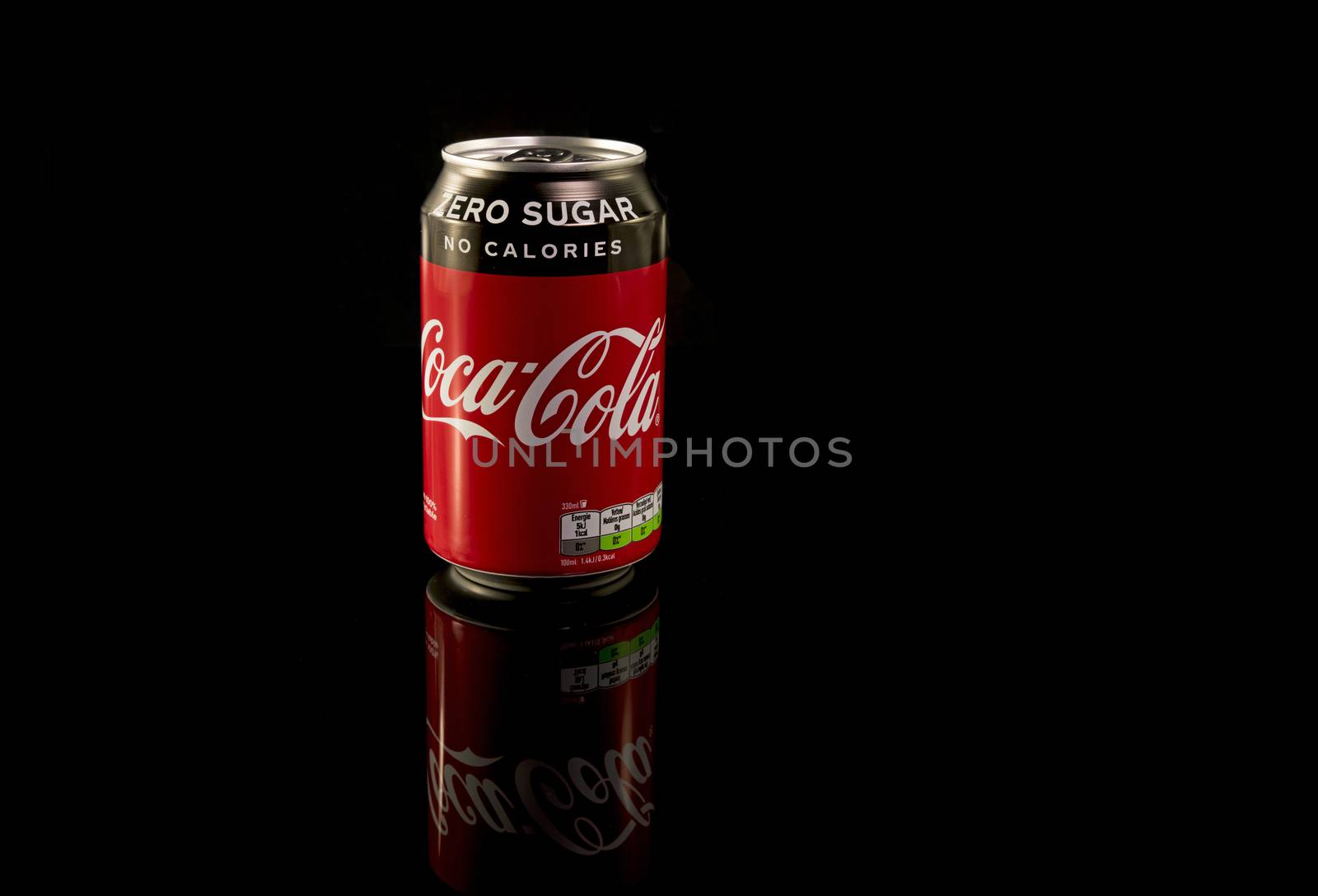 Amsterdam,28-12-2019: Coca-Cola Zero can 330 ml , no sugar, produced by The Coca-Cola Company isolated on black background, It's popular soft drink soda sold in vending machines and general store.