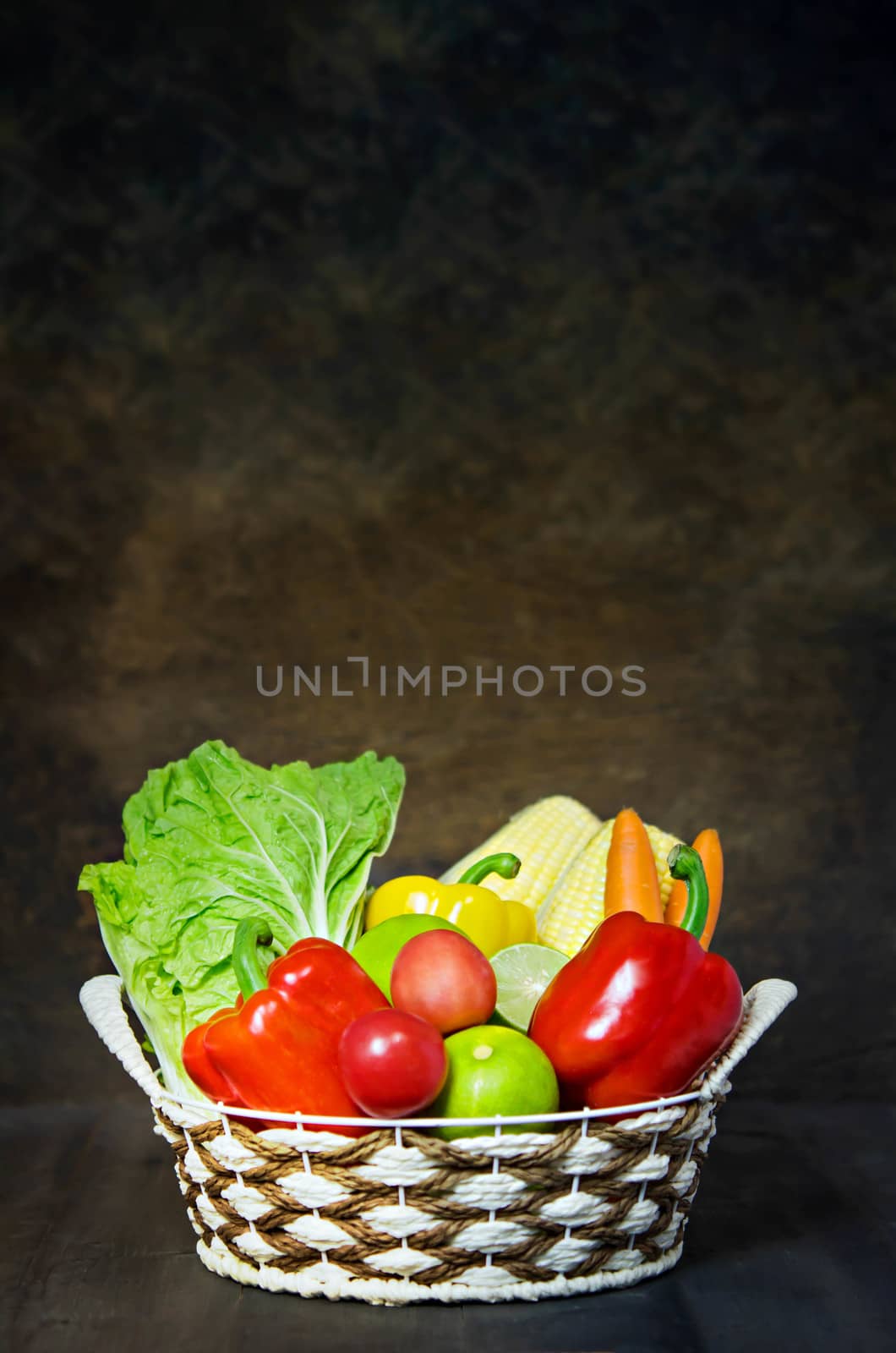 vegetables and fruits in wicker basket  by rakratchada