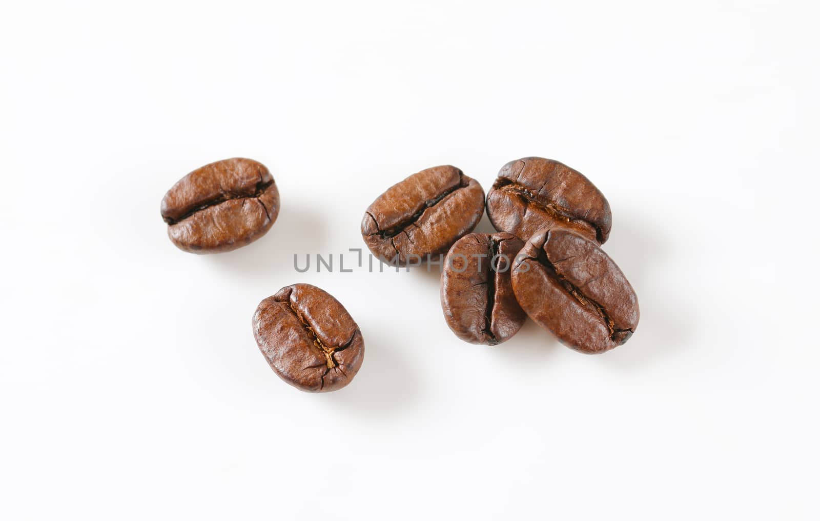 Roasted coffee beans by Digifoodstock