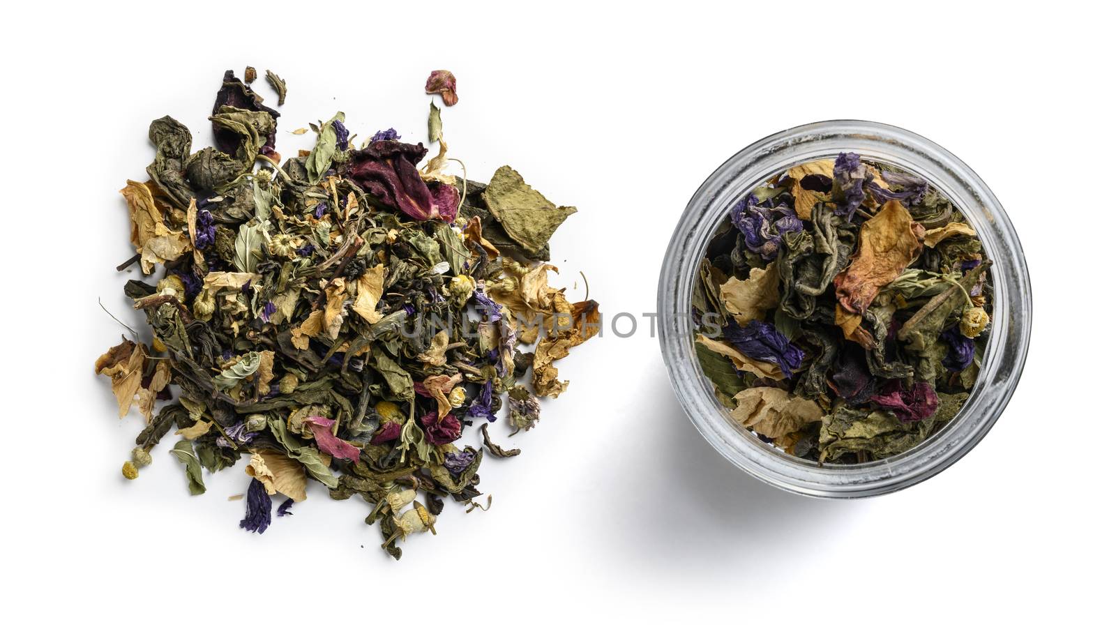 Green tea with natural aromatic additives. Top view on white background.